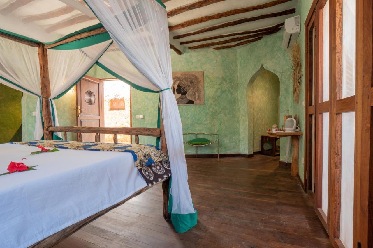 Mamamapambo Boutique Hotel Джамбиани Экстерьер фото